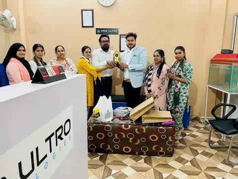 Students and trainers celebrating together at the Webultro Training institute