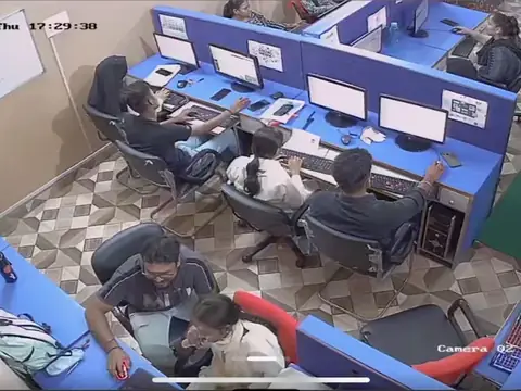 Overhead view of students working at computers in the Webultro Training lab