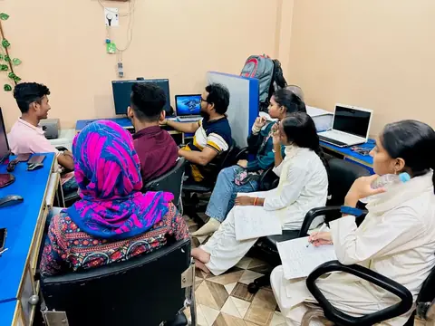 Group of students learning together in the Webultro Training classroom